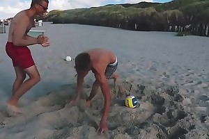 Hot guys play Grassland on beach (no sex)