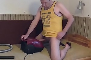 Julio shagging  vacuum cleaner