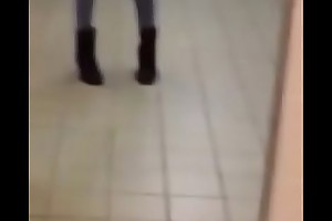 Downcast tgirl showing off in public bathroom