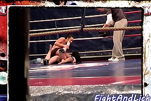 Muscular lesbians wrestling all over a difficulty boxing ring