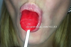 Mouth Charm - Jessika Chafing a Lollipop