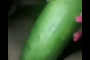 Beneficent latina masturbating with a cucumber for me.