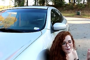 Nerdy red head gets fucked on car