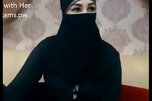Indian Muslim girl in hijab stay chatting on webcam